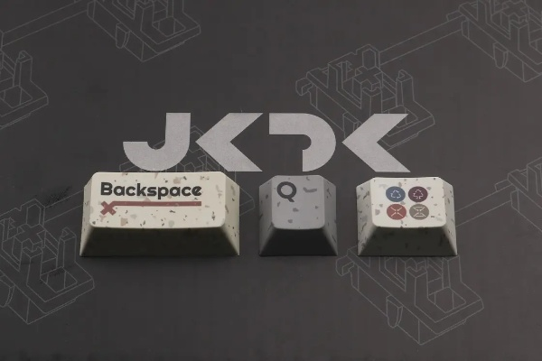 石墩子键帽惊现江湖，独特设计引领游戏新潮流